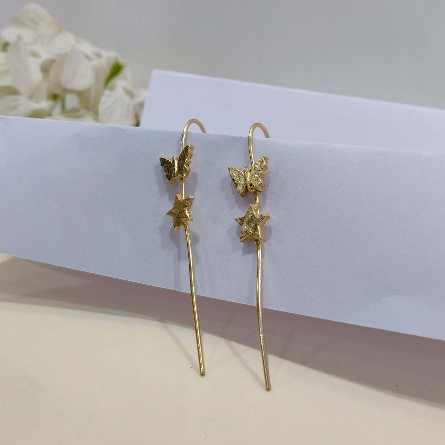 BUTTERFLY AND STAR EARCUFF