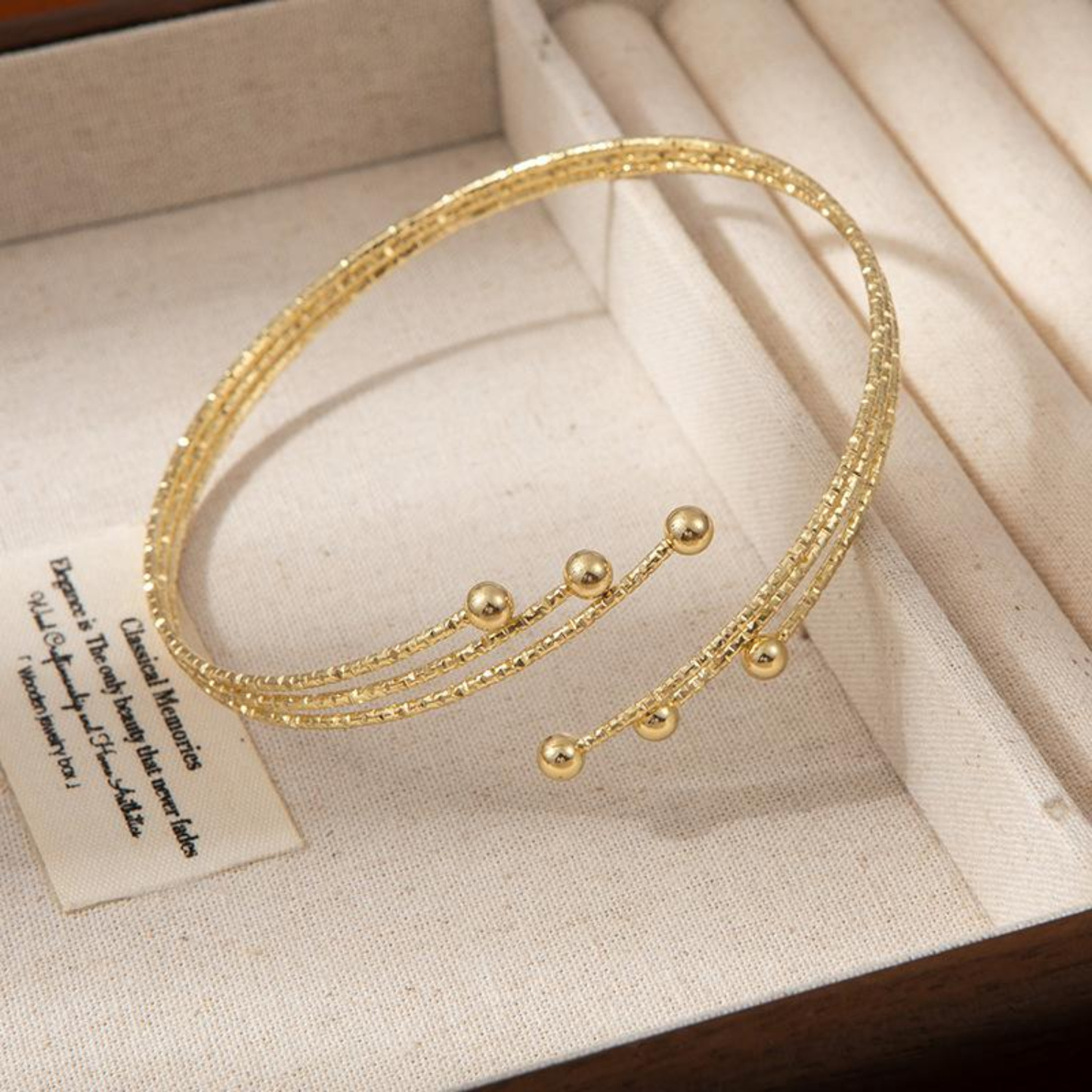 TEXTURED GOLD MULTILINE ARM CUFF