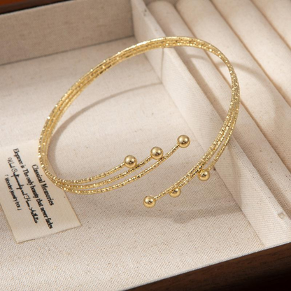 TEXTURED GOLD MULTILINE ARM CUFF