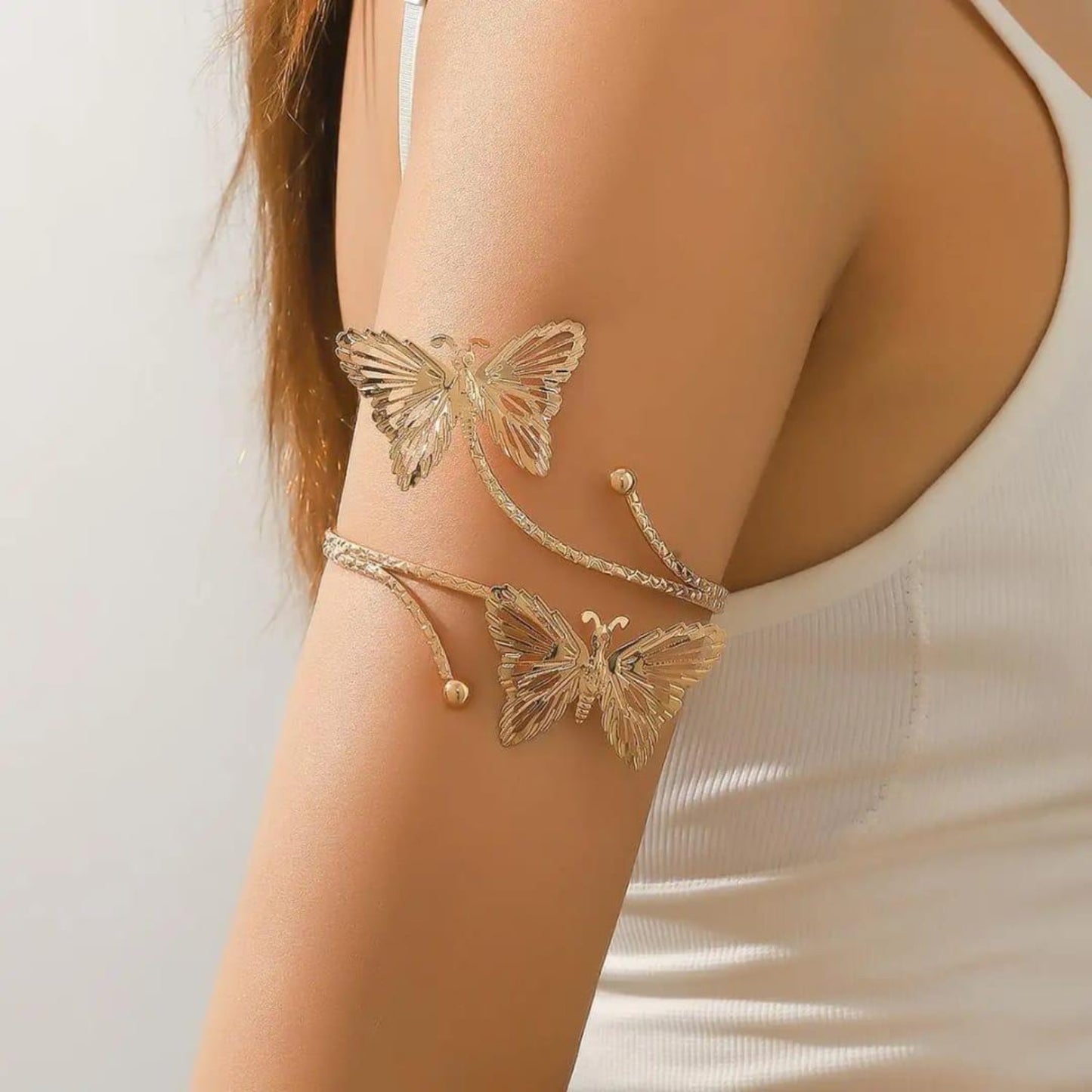 BUTTERFLY ARM CUFF