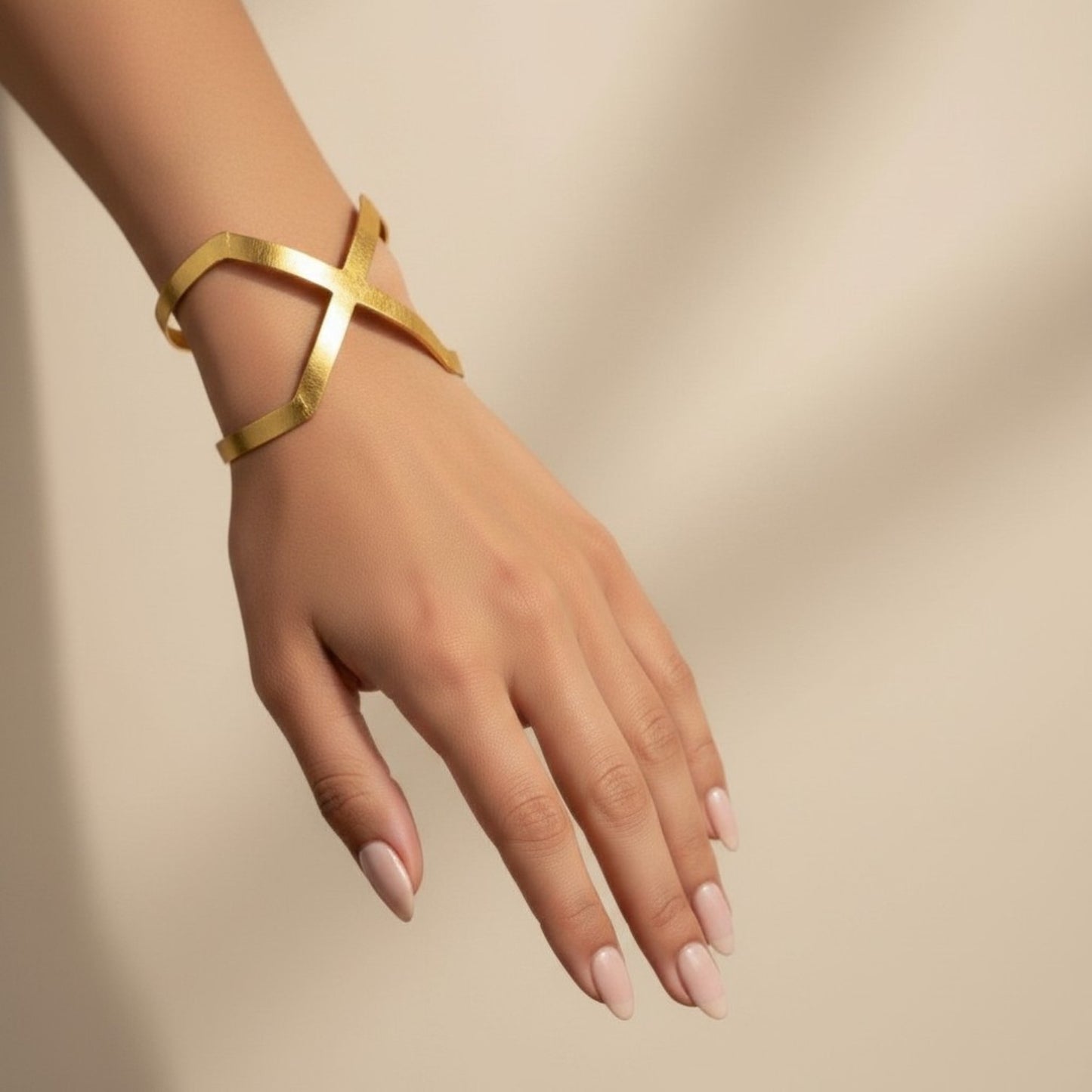 XENIA ADJUSTABLE BRASS HANDCUFF